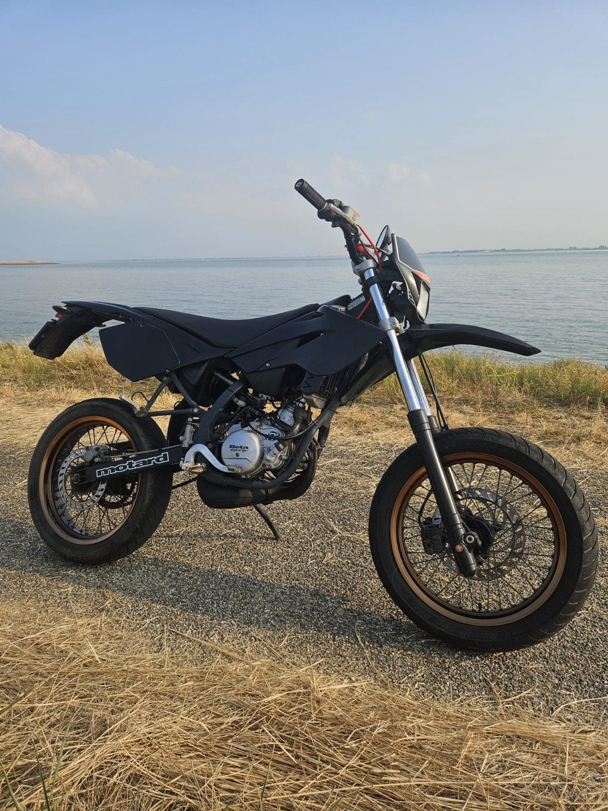 zwarte brommer beta. 50cc, Ophalen
