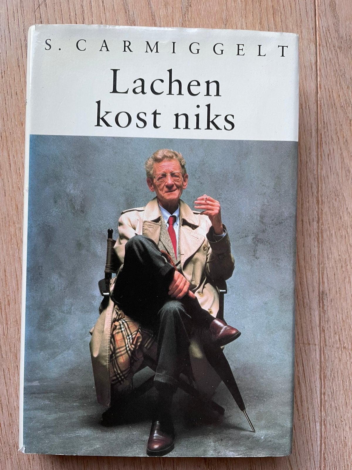 S. Carmiggelt - Lachen kost niks, Boeken, Ophalen of Verzenden, Zo goed als nieuw