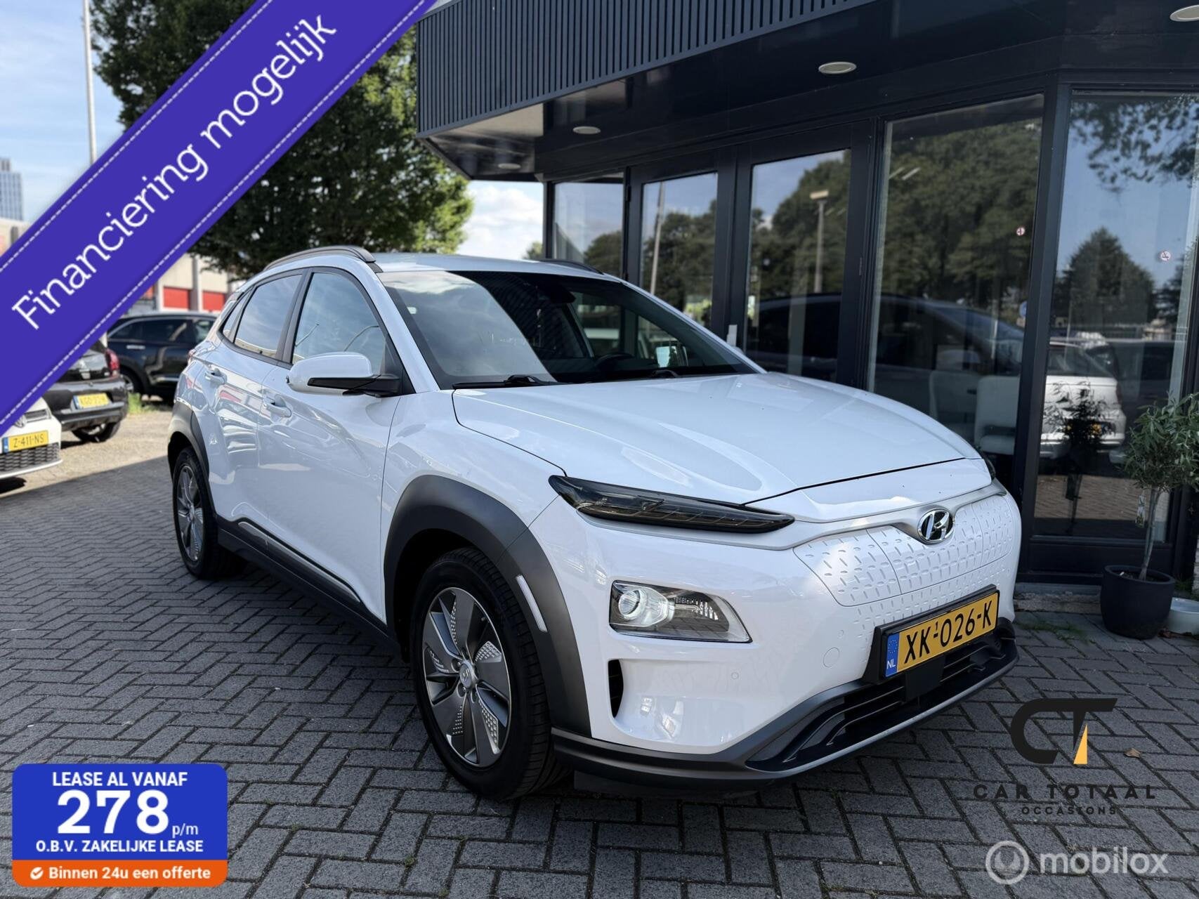 Hyundai Kona EV Fashion 64 kWh|CARPLAY|HEAD-UP|NAP, Auto's, Gebruikt, Wit, Origineel Nederlands, 630 min