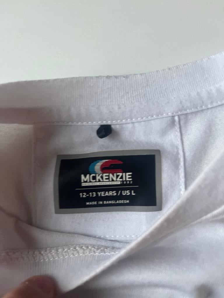McKenzie T-shirt wit/zwart, maat L (12-13 jaar), Ophalen, Zo goed als nieuw, Maat 52/54 (L), Wit