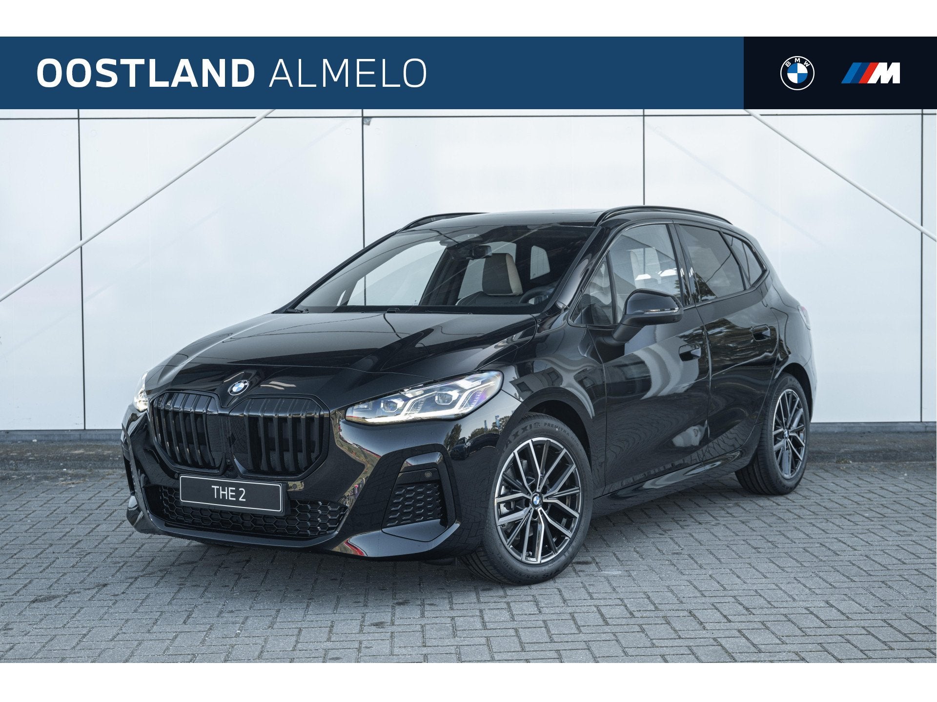 BMW 2 Serie Active Tourer 220i M Sport Automaat / Panoramada, Auto's, Stoelverwarming, 156 pk, Zwart, Leder