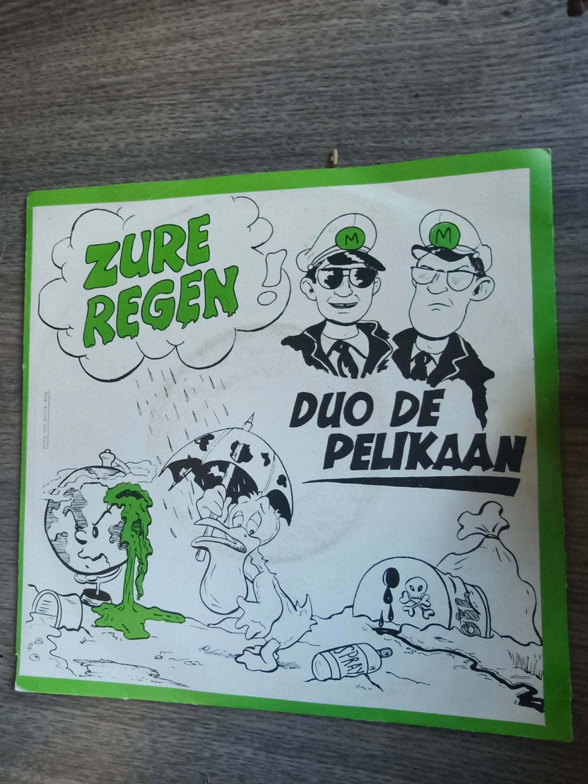 Duo De Pelikaan - Zure Regen / 't Is Wat, Die Milieuverontvu, Gebruikt, 7 inch, Ophalen of Verzenden, EP