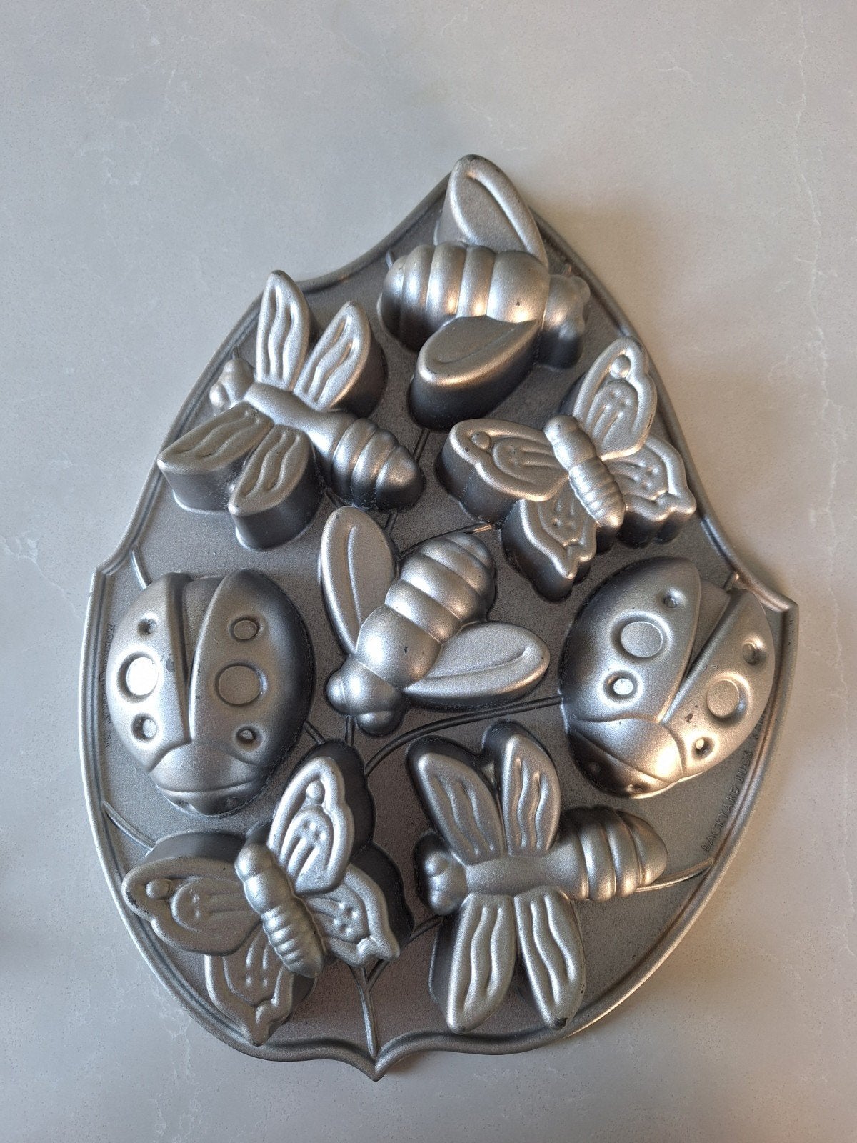 Nordic ware backyard bugs/insecten, Ophalen of Verzenden, Gebruikt, Cupcakes, Bakvorm