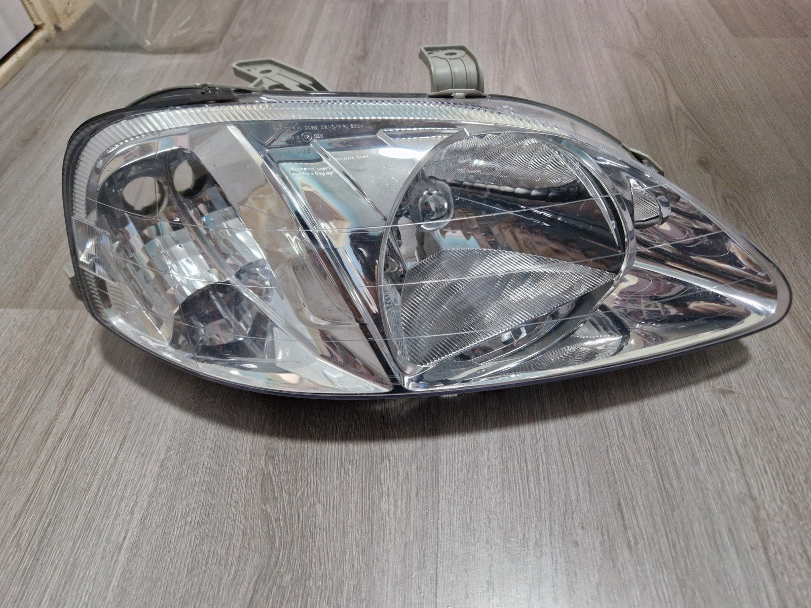 Nieuwe originele koplamp Honda Civic EK 1999-2000 facelift, Ophalen of Verzenden, Nieuw, Honda