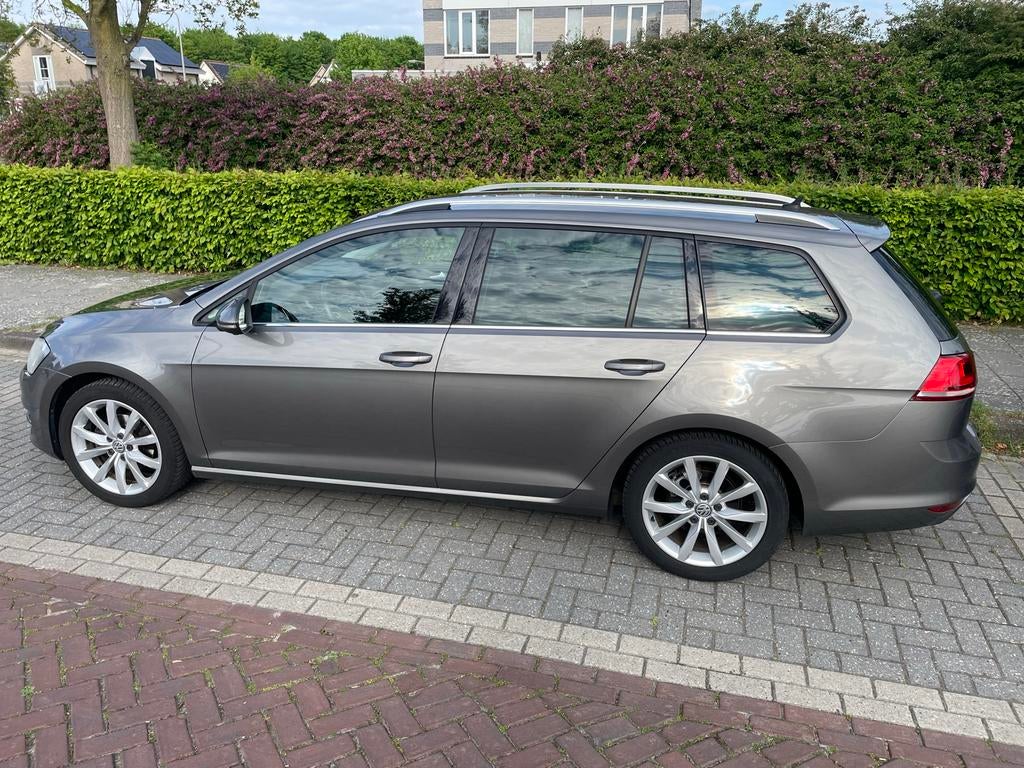 Volkswagen Golf 1.2 TSI 77KW/105PK Variant 2014 Grijs, Voorwielaandrijving, Euro 5, 4 cilinders, Leder en Stof