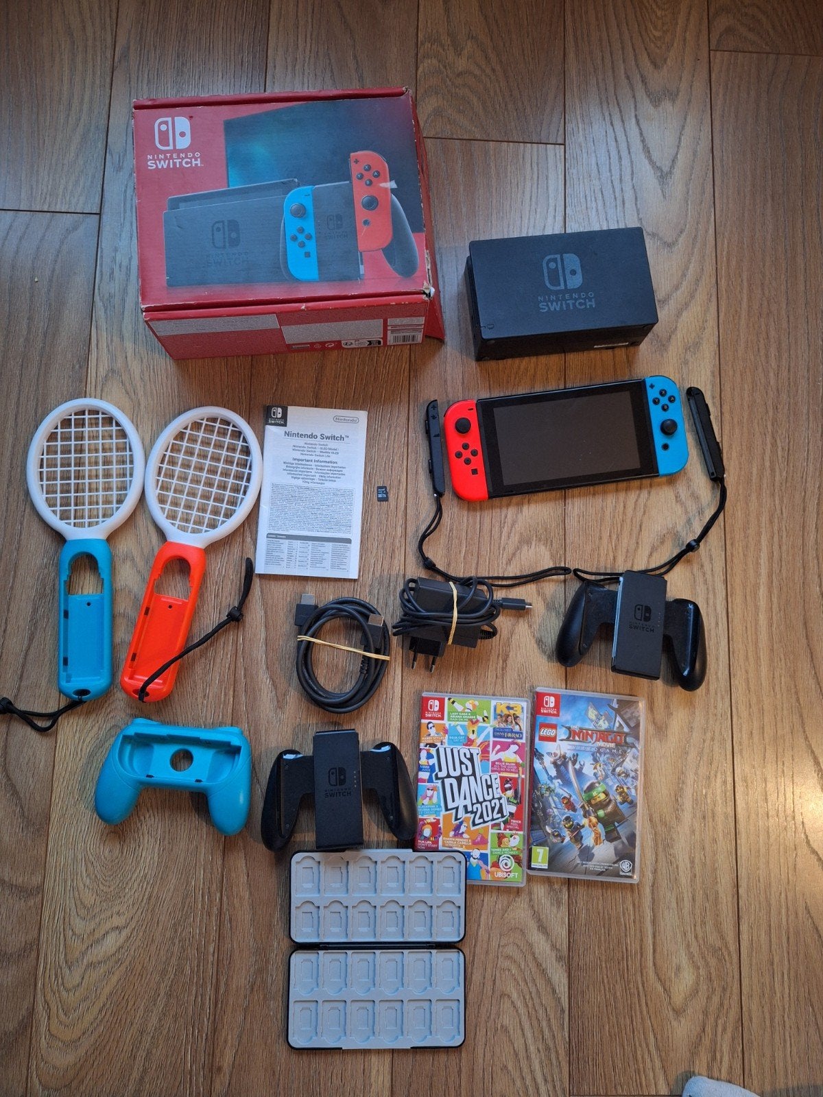 Nintendo Switch V2 met accessoires en 2 games