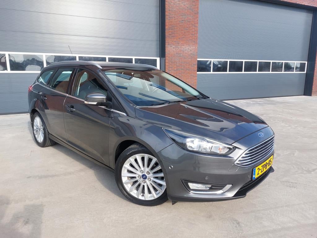 Ford Focus Wagon 1.0 Titanium Edition Airco/ECC/LMV/NAV, Gebruikt, Origineel Nederlands, Handgeschakeld, 1216 kg