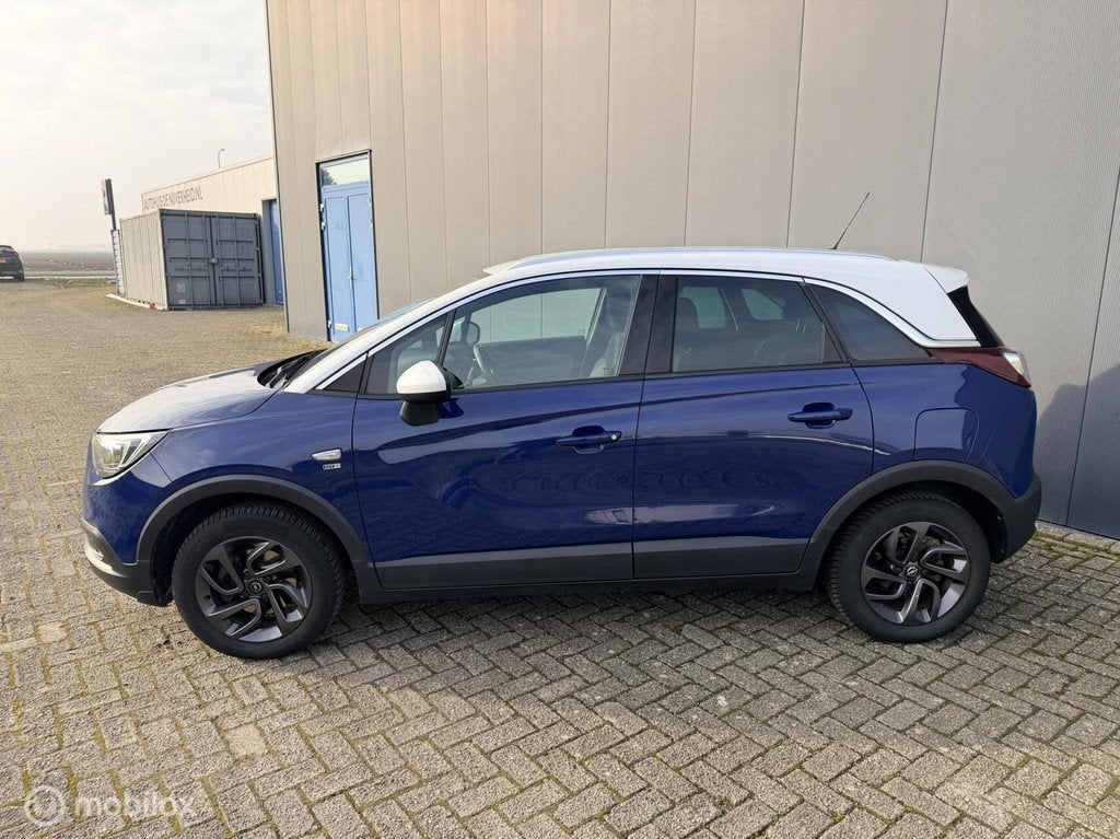 Opel Crossland X 1.2 Turbo 120 Jaar Edition automaat allseas, Auto's, Opel, 12 maanden, 840 kg, Gebruikt, Euro 6