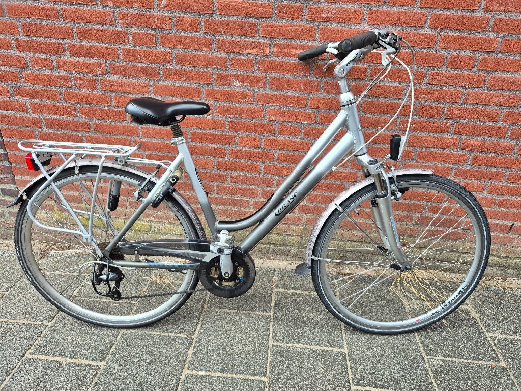 Nette Corano 28 inch met verende voorvork, Fietsen en Brommers, Fietsen | Dames | Damesfietsen, Gebruikt, Overige merken, Versnellingen