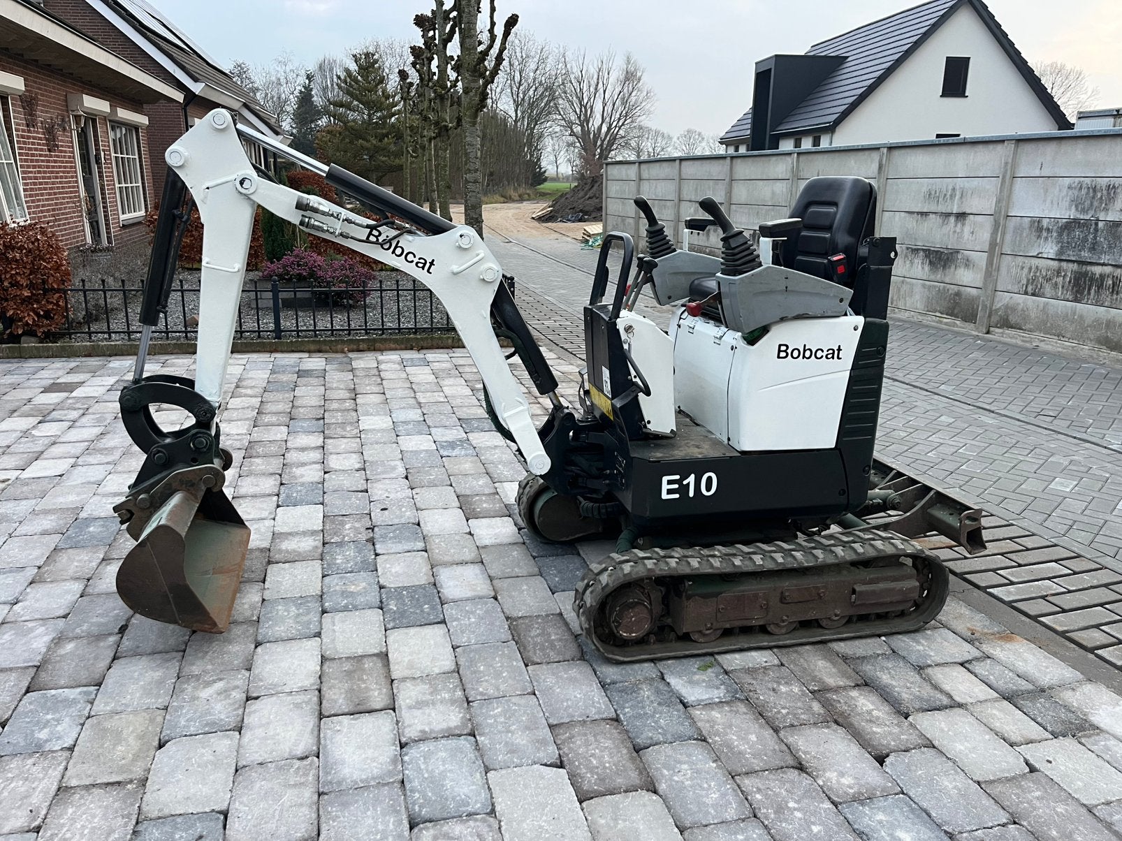 Bobcat E10 minigraver, Ophalen, Graafmachine
