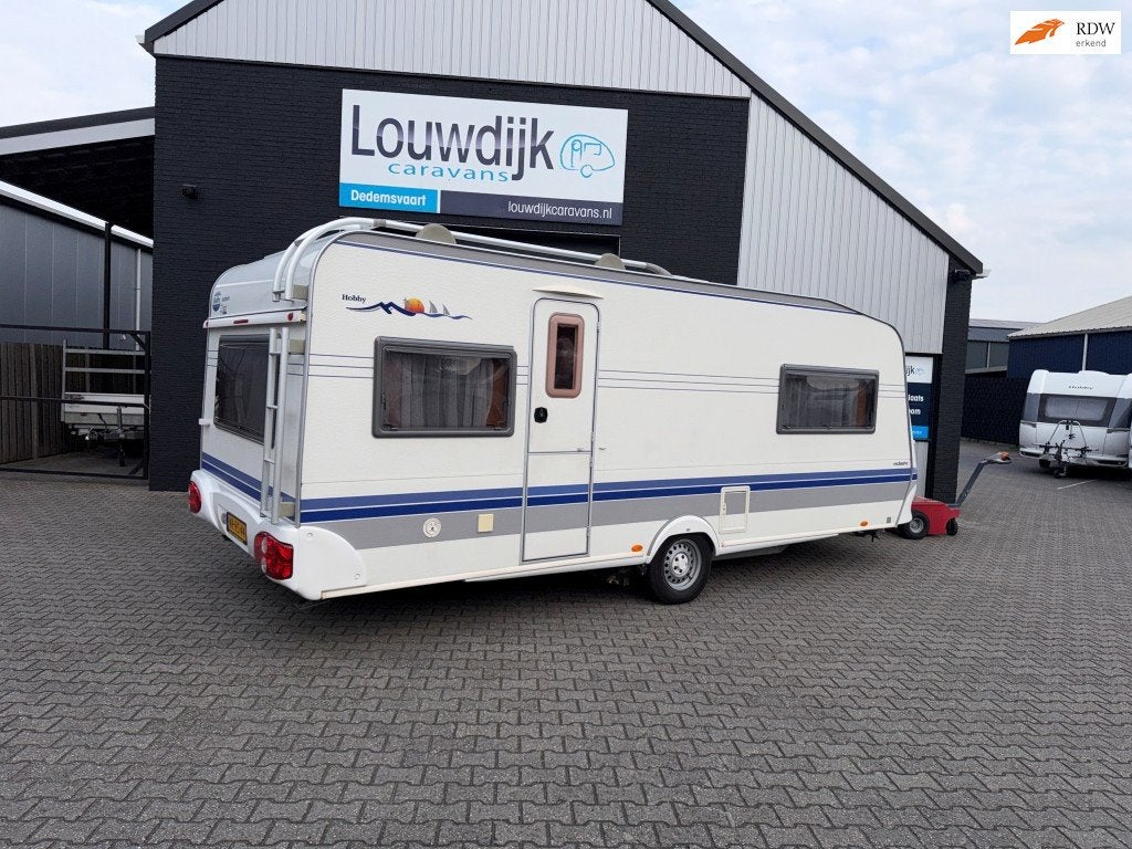 HOBBY Exclusive 560 UFF ’05 (Queensbed, Mover), Vast bed, Rondzit, Hobby, 7 tot 8 meter