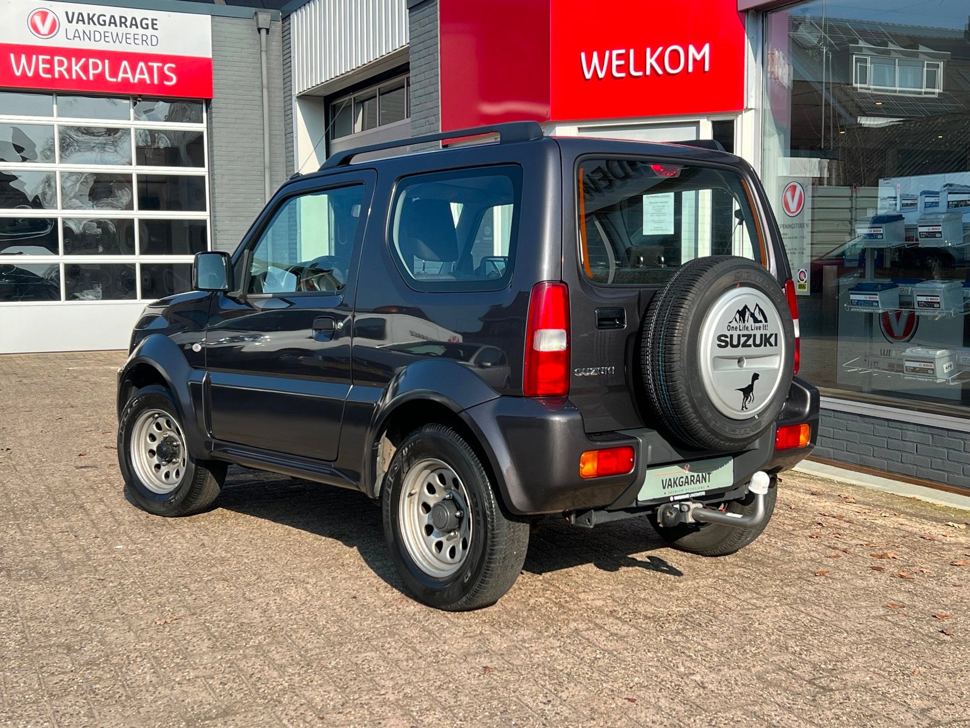 Suzuki Jimny 1.3 automaat, Trekhaak, 1e eigenaar., Auto's, Automaat, Dealer onderhouden, Gebruikt, Zwart