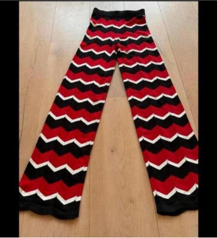 Flared stretch s/ m nieuwstaat, Ophalen of Verzenden, Zo goed als nieuw, Maat 36 (S), Lang
