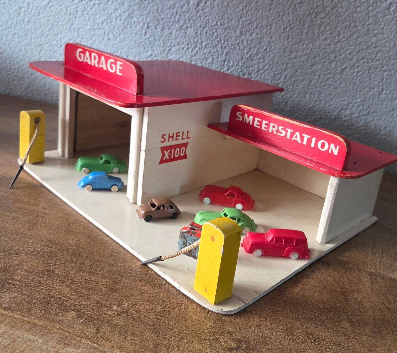 Vintage Shell X-100 Speelgoedgarage uit 1955 met 6 auto's, Ophalen of Verzenden