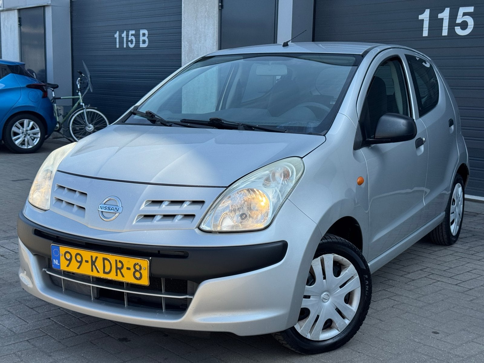 Nissan Pixo 1.0 50KW 5D 2009 Grijs, Auto's, Nissan, Voorwielaandrijving, Stof, 200 kg, 4 stoelen