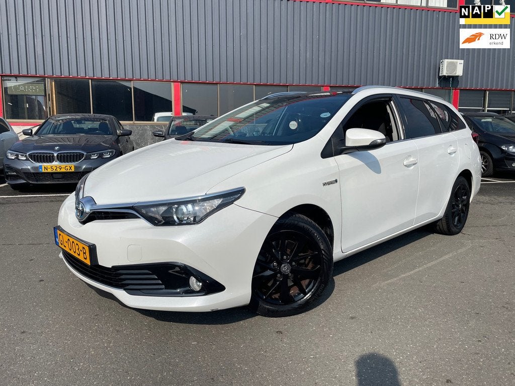 Toyota Auris Touring Sports 1.8 Hybrid Lease / AUTOMAAT / NA, Auto's, Stof, Gebruikt, Euro 6, Wit