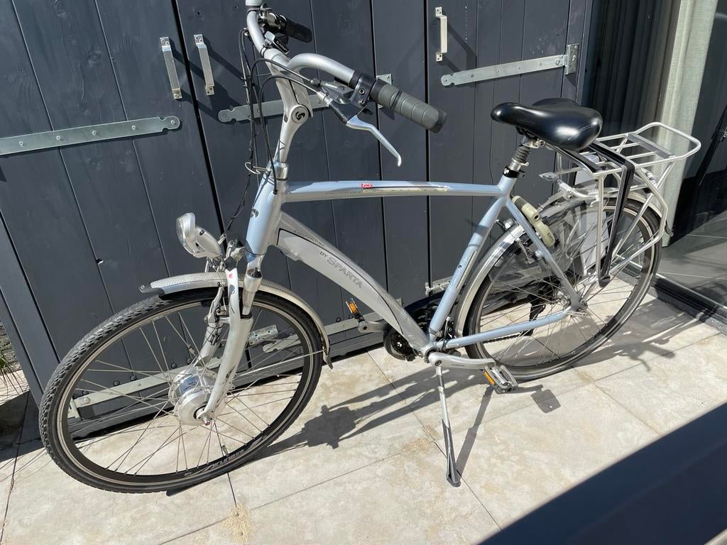 Grijze herenfiets ex elektrisch., Fietsen en Brommers, Ophalen, Sparta, Gebruikt, Velgrem