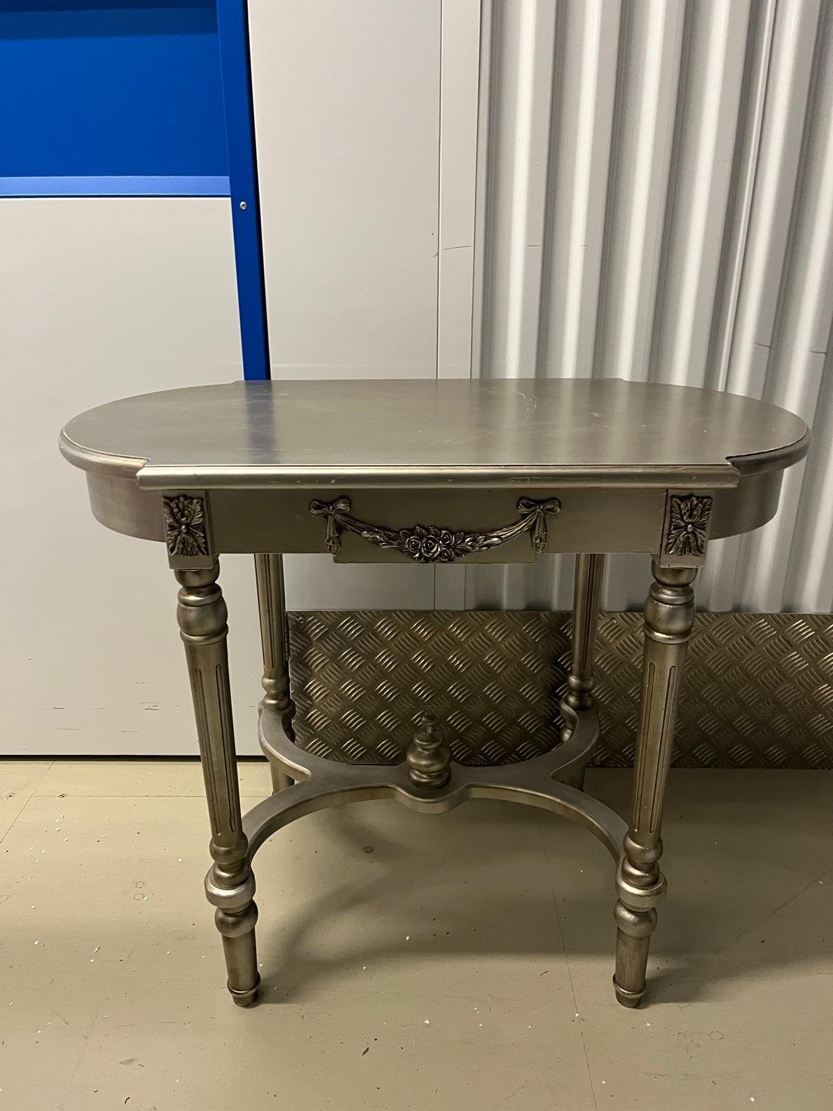 Bijzettafel xenos zilver, Ophalen