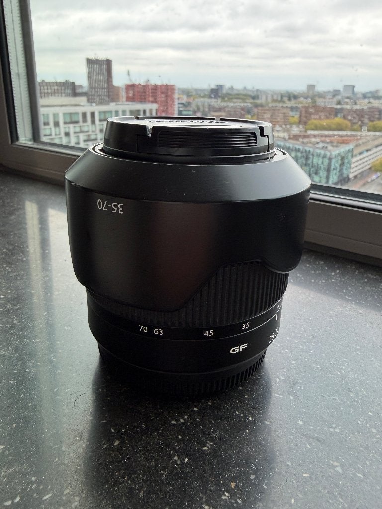 Fujifilm GF 35-70mm f/4.5-5.6 WR - werkend, schade, Fujifilm, Gebruikt, Zonnekap, Ophalen of Verzenden