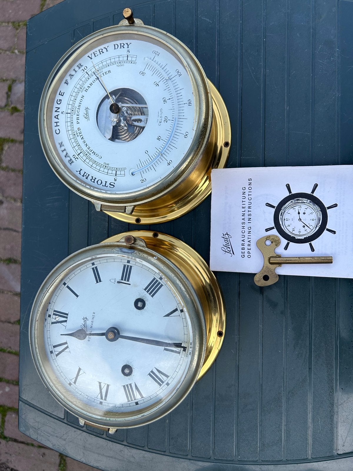 Scheepsklok en barometer merk Schatz met toebehoren, Ophalen