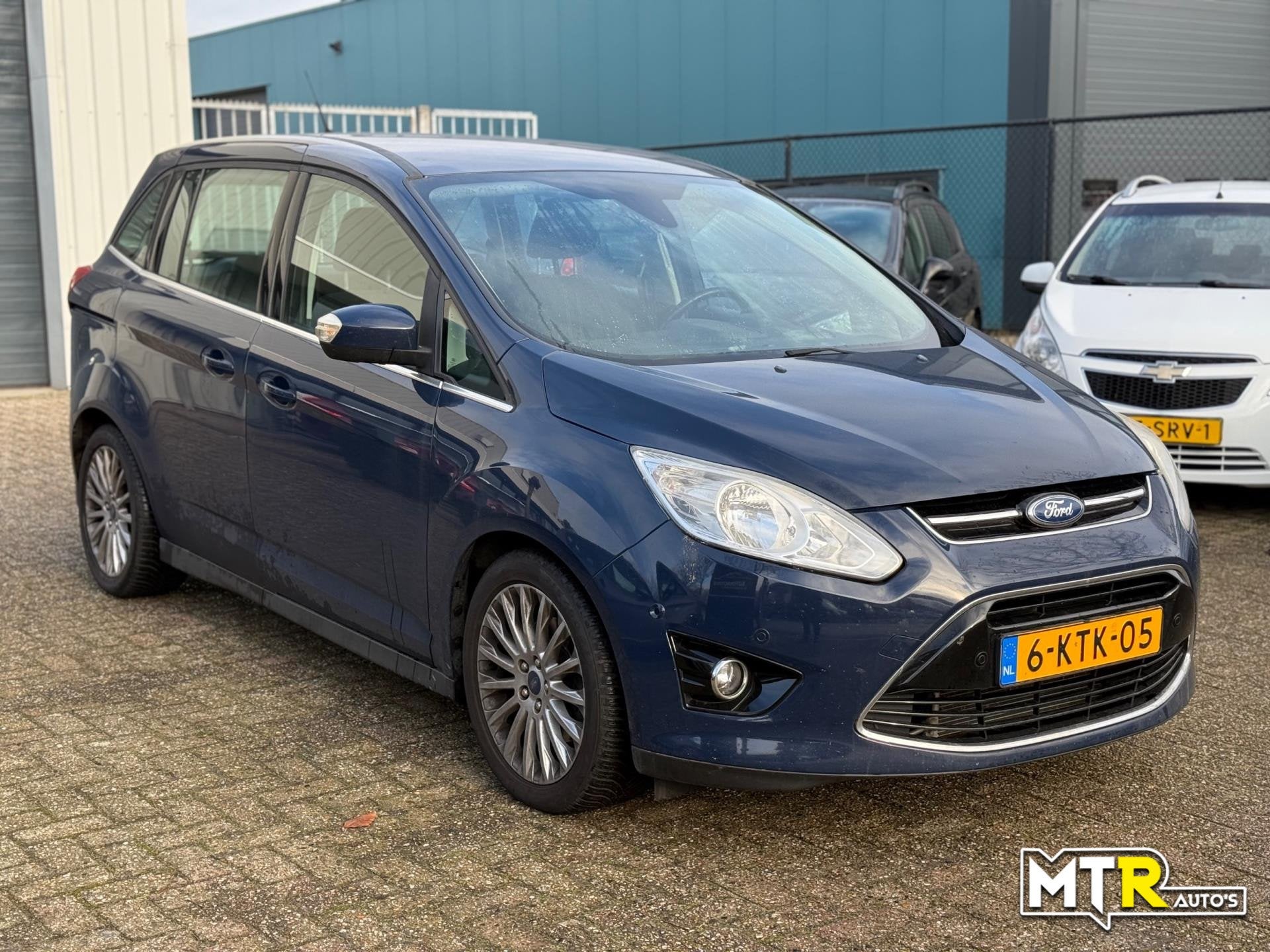 Ford Grand C-Max 1.0 Titanium 7p. LET OP!, Auto's, Voorwielaandrijving, Gebruikt, Zwart, Blauw