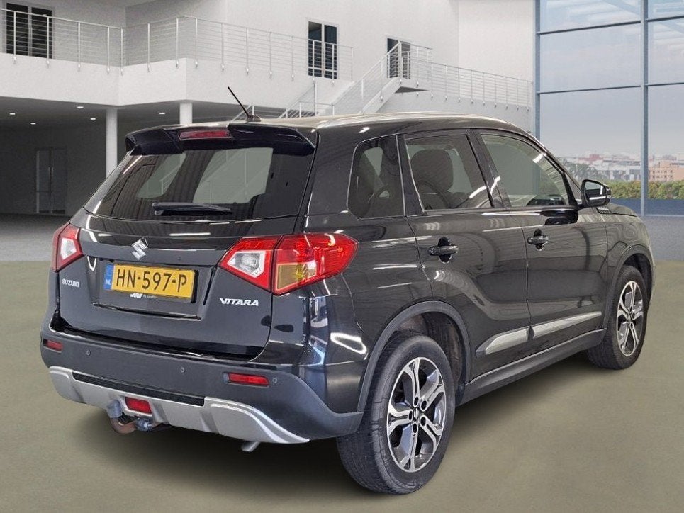 Suzuki Vitara 1.6 High Executive 2e Eigenaar NL-auto +NAP, Auto's, Dealer onderhouden, 4 cilinders, 400 kg, Zwart