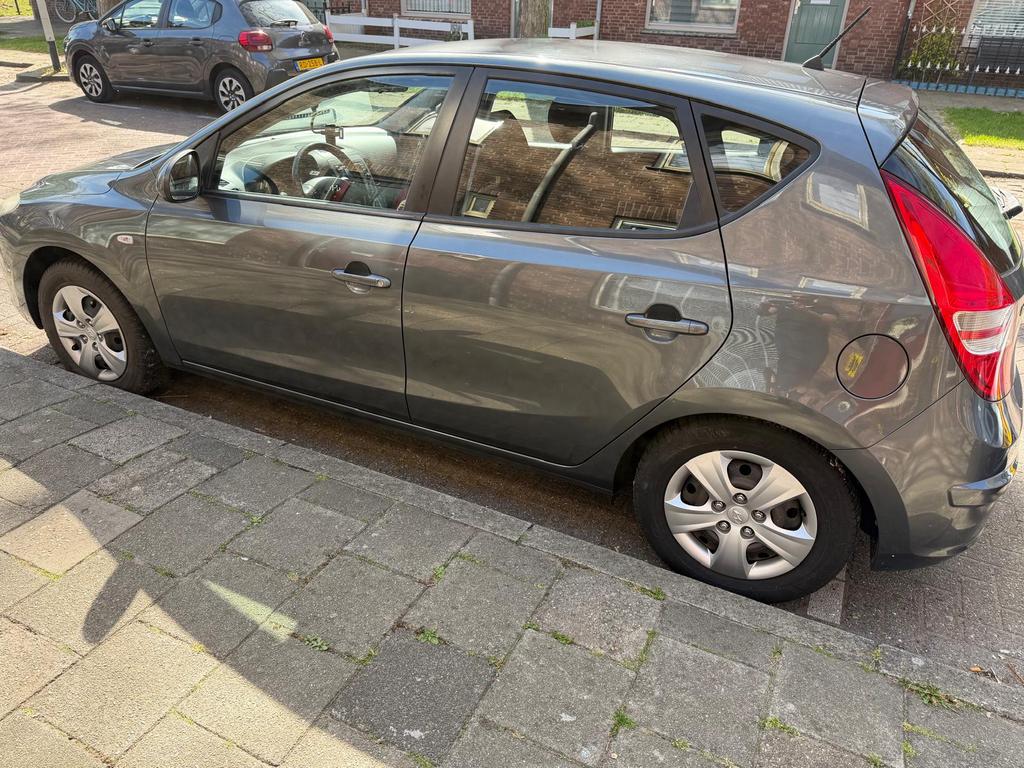 Hyundai i30 1.4i Cvvt 109pk Blue 2009 Grijs, Auto's, Hyundai, Voorwielaandrijving, 4 cilinders, 1396 cc, Origineel Nederlands