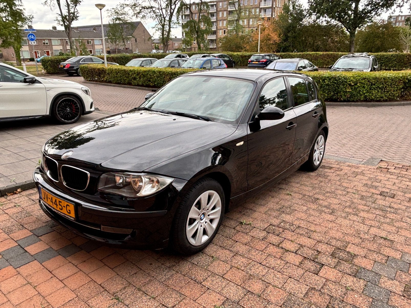 LAATSTE KANS BMW 1-Serie 1.6 116I 2007 Zwart, Auto's, 1596 cc, Zwart, 4 cilinders, 635 kg
