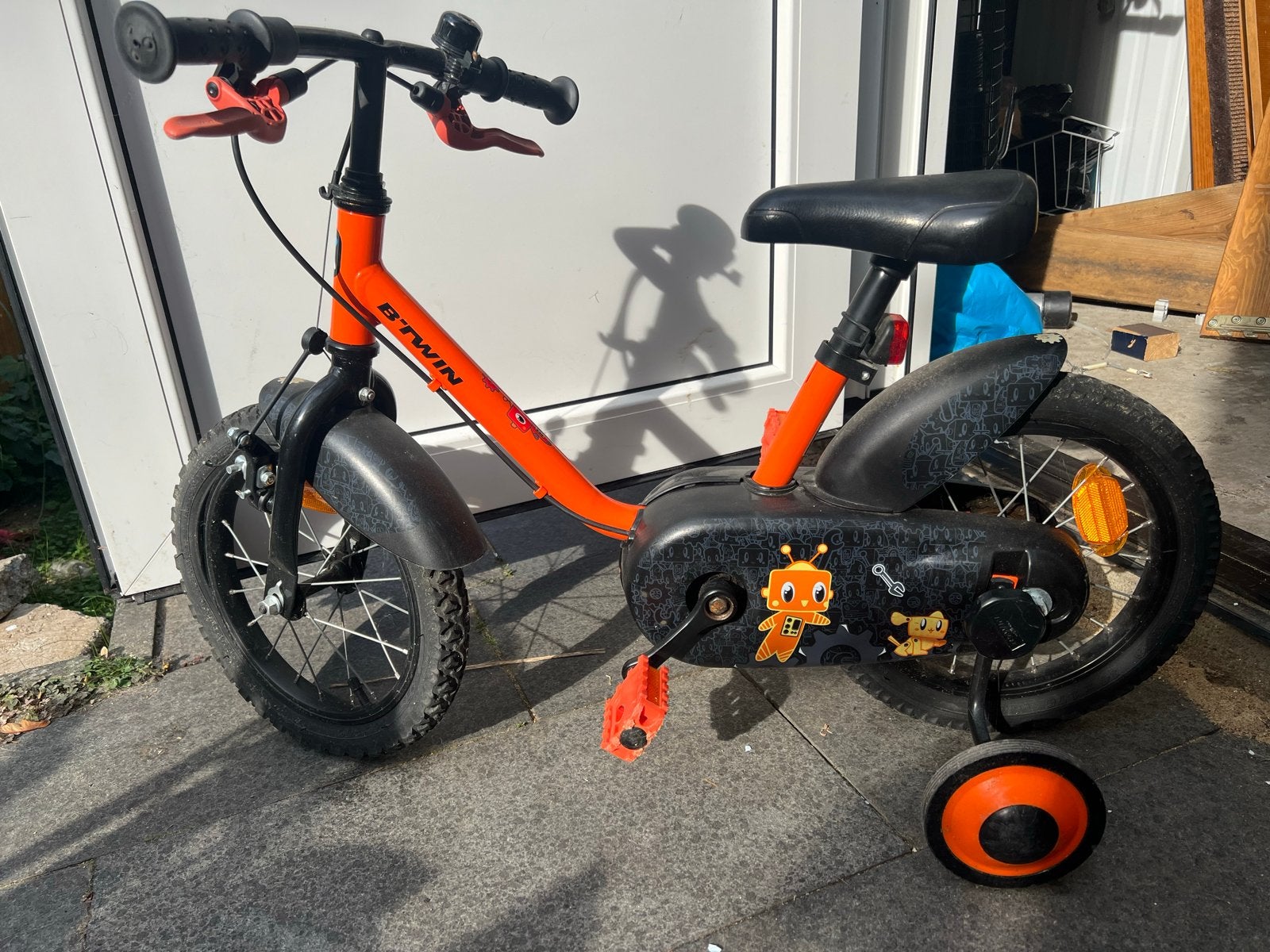 B'TWIN Kinderfiets Oranje met Zijwieltjes, Ophalen, Zijwieltjes, Velgrem, 16 tot 20 inch
