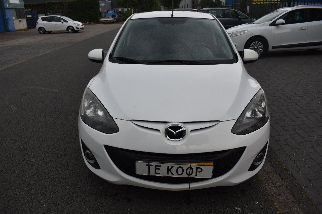 Mazda 2 1.3 Bifuel 62KW 5DRS 2012 Wit NIEUWE APK, Auto's, Mazda, Voorwielaandrijving, 15 km/l, 37 €/maand, Bluetooth