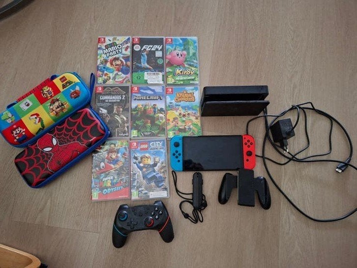 Complete Nintendo Switch OLED (2022) Bundel – met 8 topgames, Spelcomputers en Games, Spelcomputers | Nintendo Switch, Gebruikt