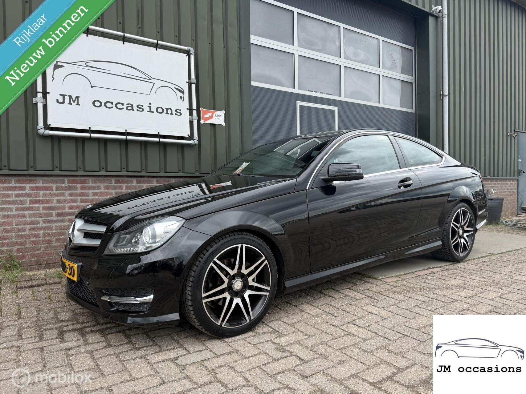 Mercedes C-klasse Coupé 180 AMG|Xenon|Navi|Cruise|F1 flippe, Automaat, Euro 5, Achterwielaandrijving, 4 stoelen