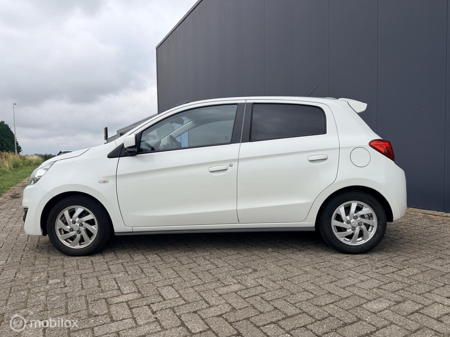 Mitsubishi Space Star 1.0 Intense|trekhaak|allseason banden, Auto's, Mitsubishi, Stof, Gebruikt, Wit, Origineel Nederlands