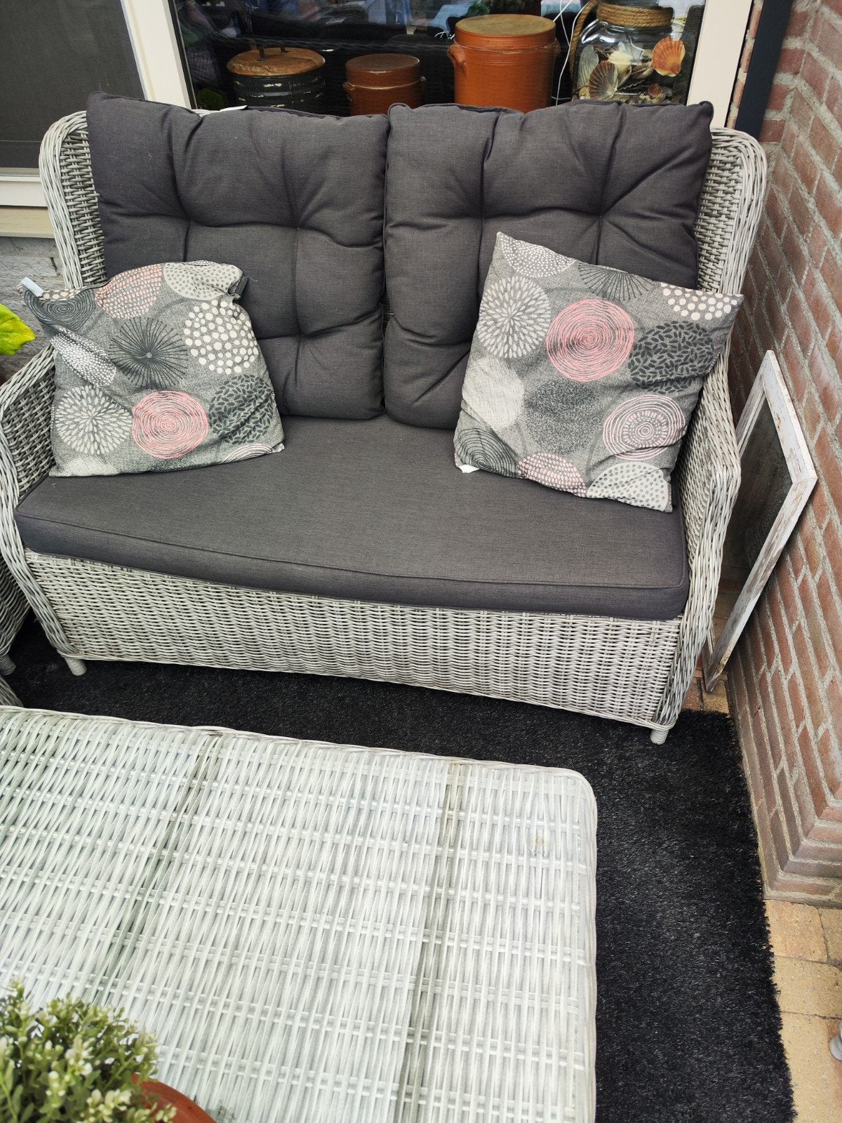 tuinbank wicker met mooie kussens, Tuin en Terras, Ophalen, Zo goed als nieuw