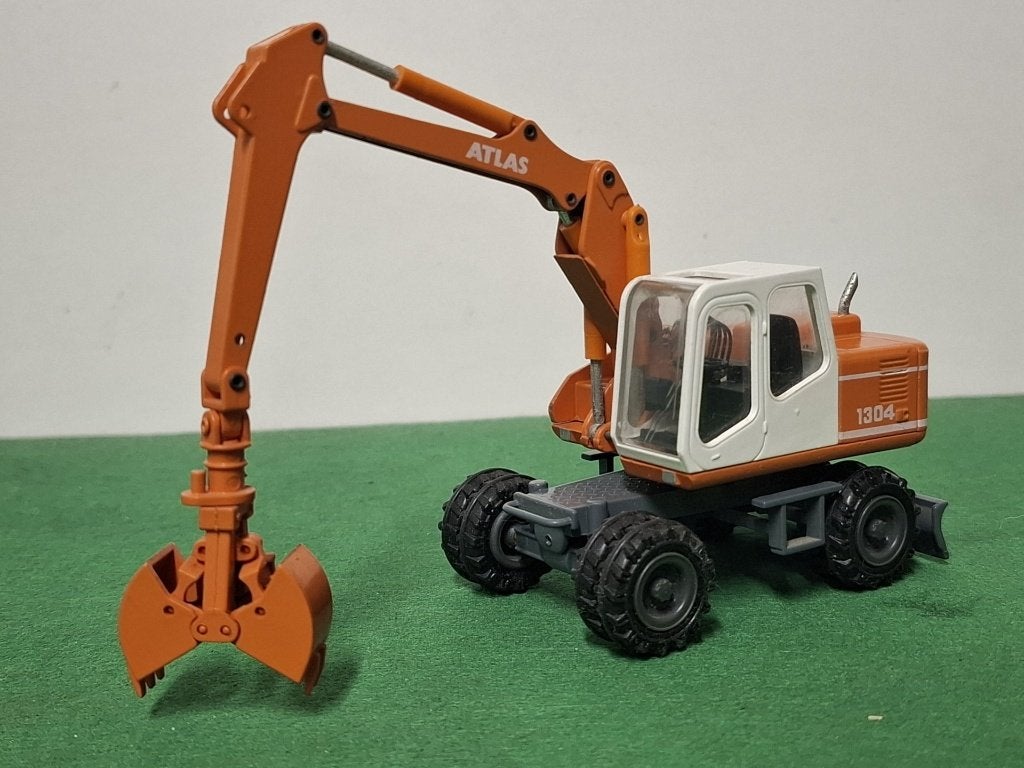 Atlas 1304 graafmachine Conrad 1/50, Hobby en Vrije tijd, Modelauto's | 1:50, Ophalen of Verzenden, Zo goed als nieuw, Overige typen