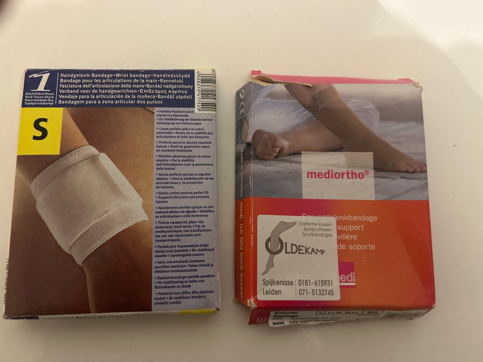 Nieuw elastische kousen en handbandage., Ophalen of Verzenden, Nieuw