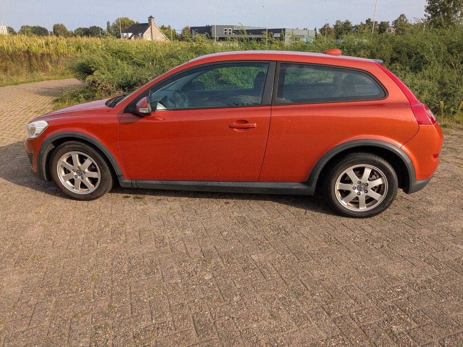 Volvo C30 1.6 2010, Auto's, Volvo, Voorwielaandrijving, 1596 cc, Stof, Zwart