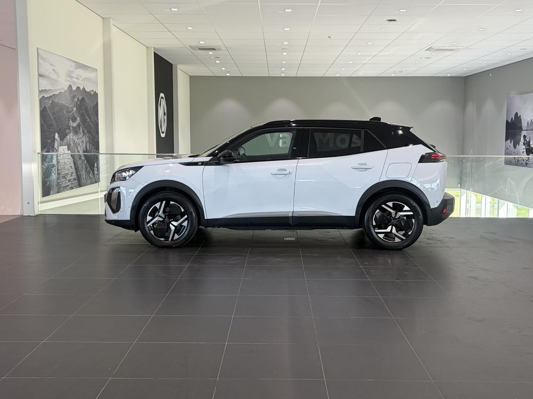 Peugeot e-2008 EV GT Avantage 54 kWh SoH 96% | Climate Contr, Auto's, 12 maanden, Stof, Gebruikt, 156 pk