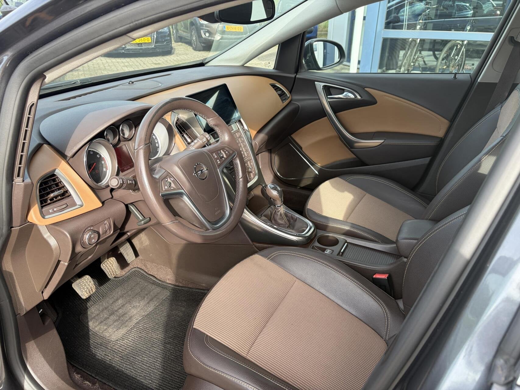 Opel Astra Sports Tourer 1.4 Turbo Cosmo airco cruise, Voorwielaandrijving, Euro 5, Gebruikt, 4 cilinders