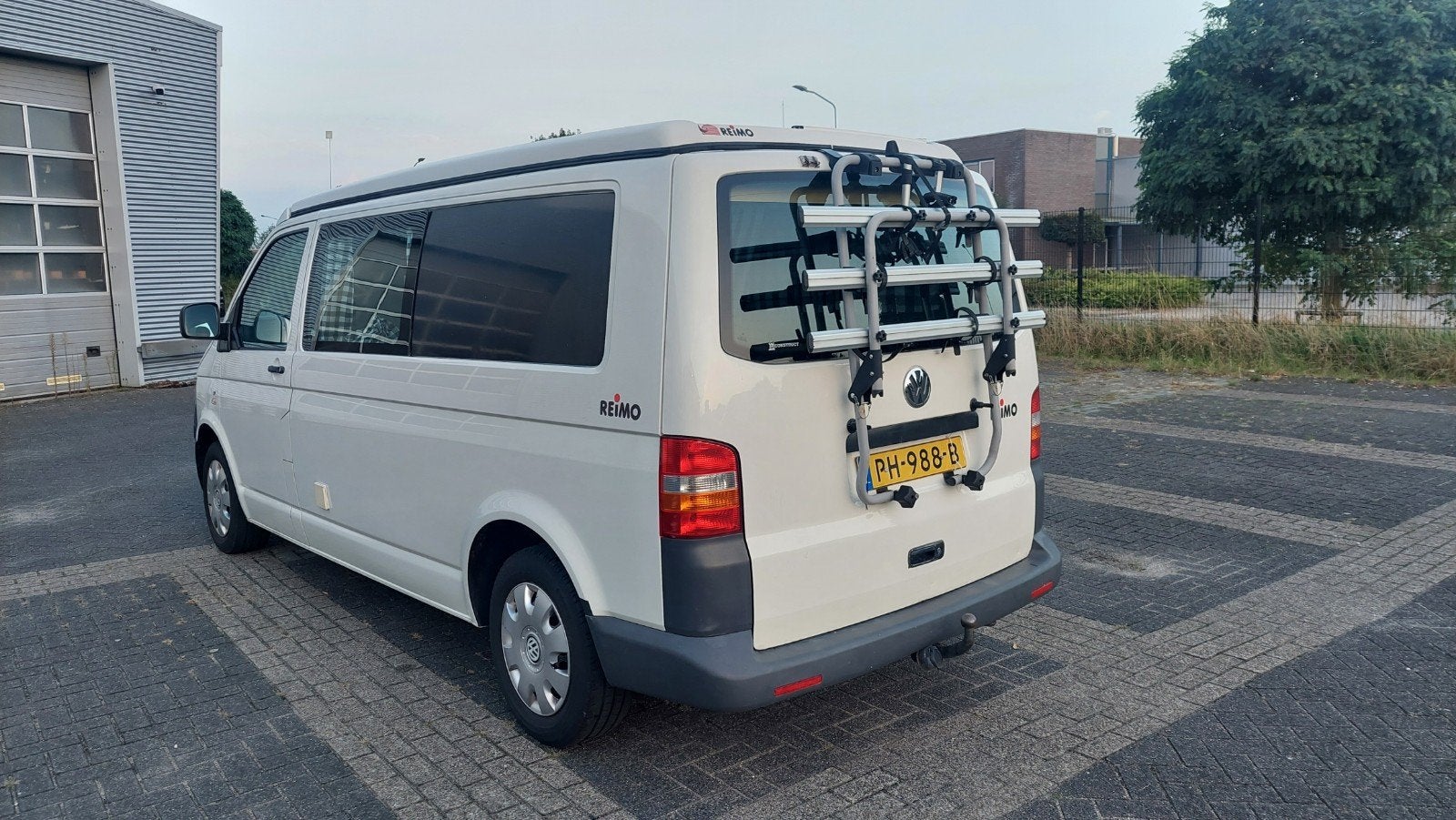 Foto 21 van VW T5 REIMO # 6 ZIT+4 SLAAPPLAATSEN # SLAAPHEFDAK #LENGTEZIT