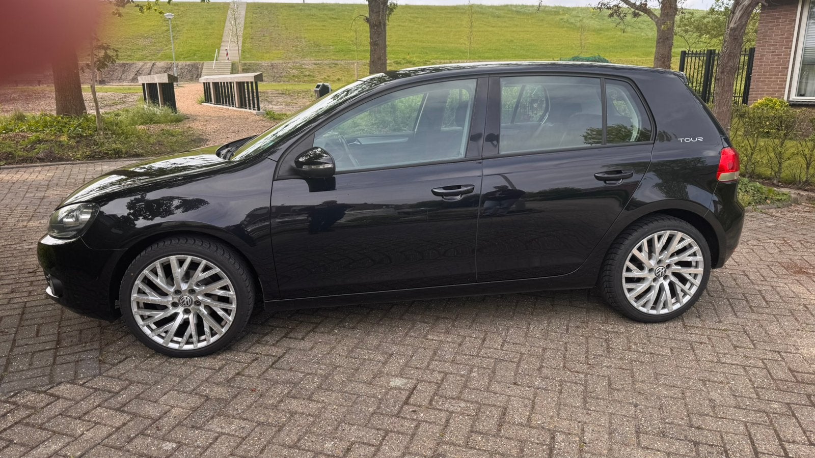 Volkswagen Golf 1.2 TSI 77KW 5D 2011 Zwart, Auto's, Voorwielaandrijving, Stof, Zwart, 4 cilinders
