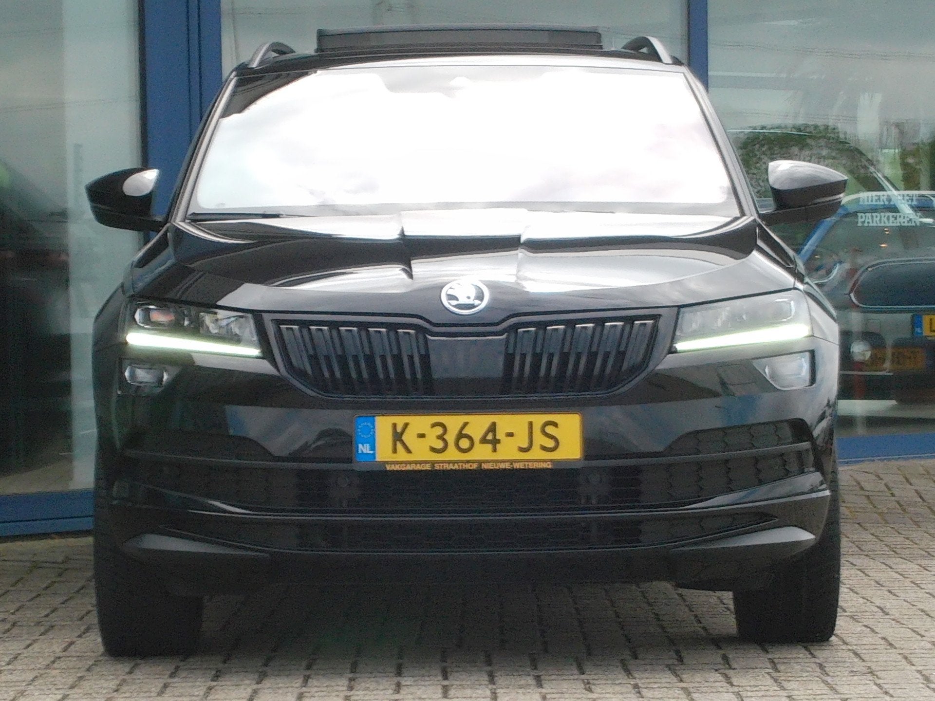Skoda Karoq 1.5 TSI Sportline Business Automaat / Trekhaak /, Stof, 4 cilinders, Zwart, Bedrijf