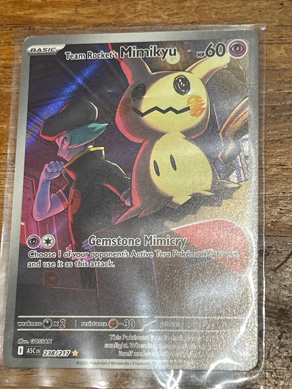 Team Rocket's Mimikyu Pokemon kaart (238/217), Ophalen of Verzenden, Zo goed als nieuw, Losse kaart