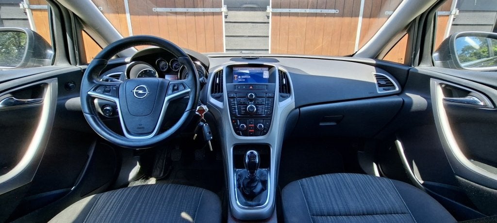 Opel Astra 1.4 Turbo Edition | Airco | Trekhaak | Bluetooth, Euro 5, Stof, Gebruikt, 680 kg