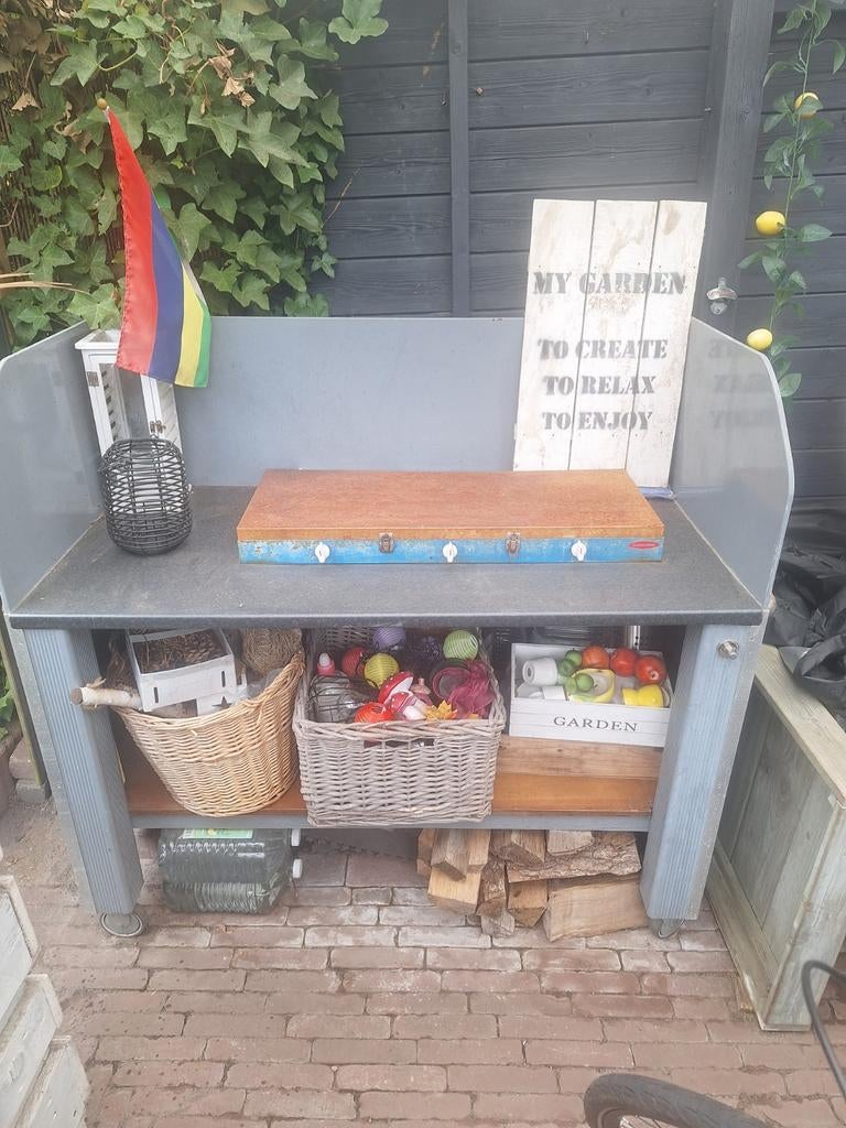 Buitenkeuken met gasfornuis, Ophalen
