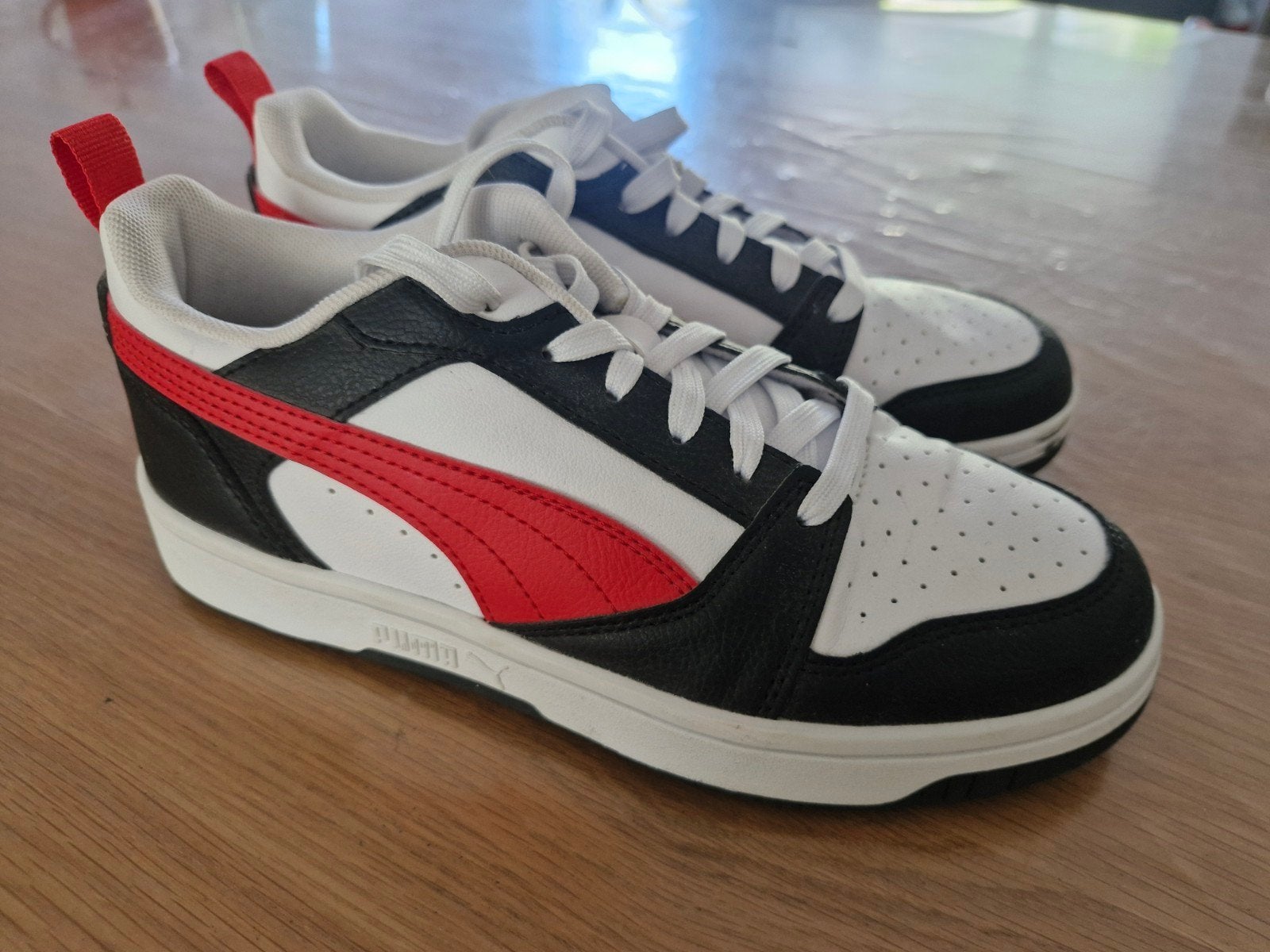schoenen Puma, Ophalen