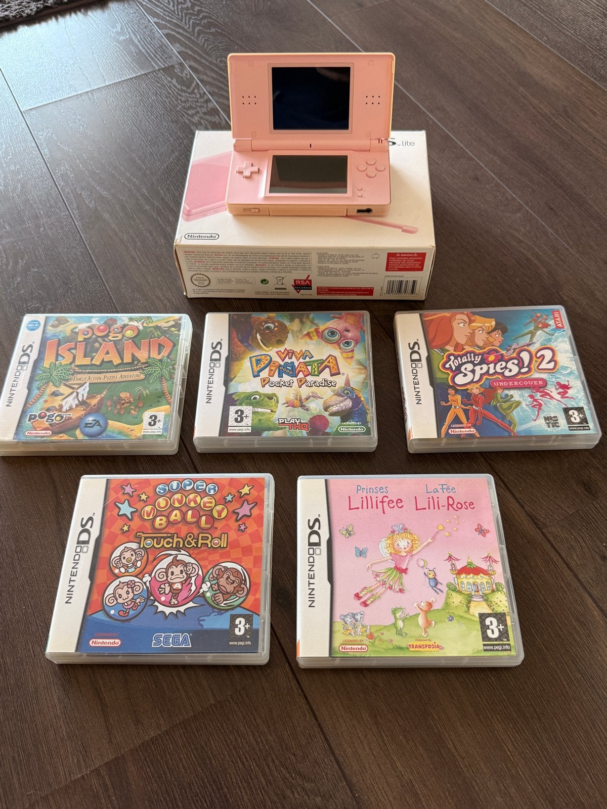 Roze Nintendo DS Lite met 5 spellen - Compleet pakket, Spelcomputers en Games, Games | Nintendo DS, Ophalen, Overige genres, 1 speler