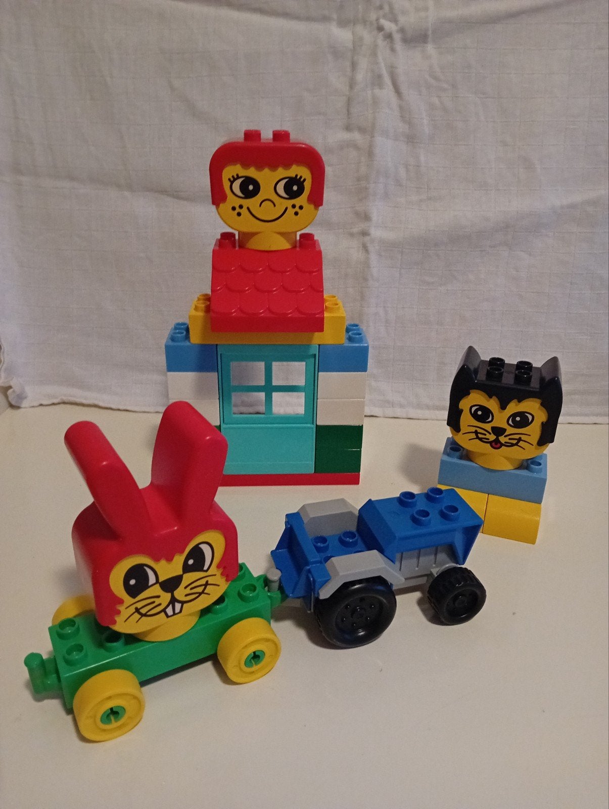 LEGO DUPLO set met huis, tractor en 3 figuren, Ophalen of Verzenden, Zo goed als nieuw