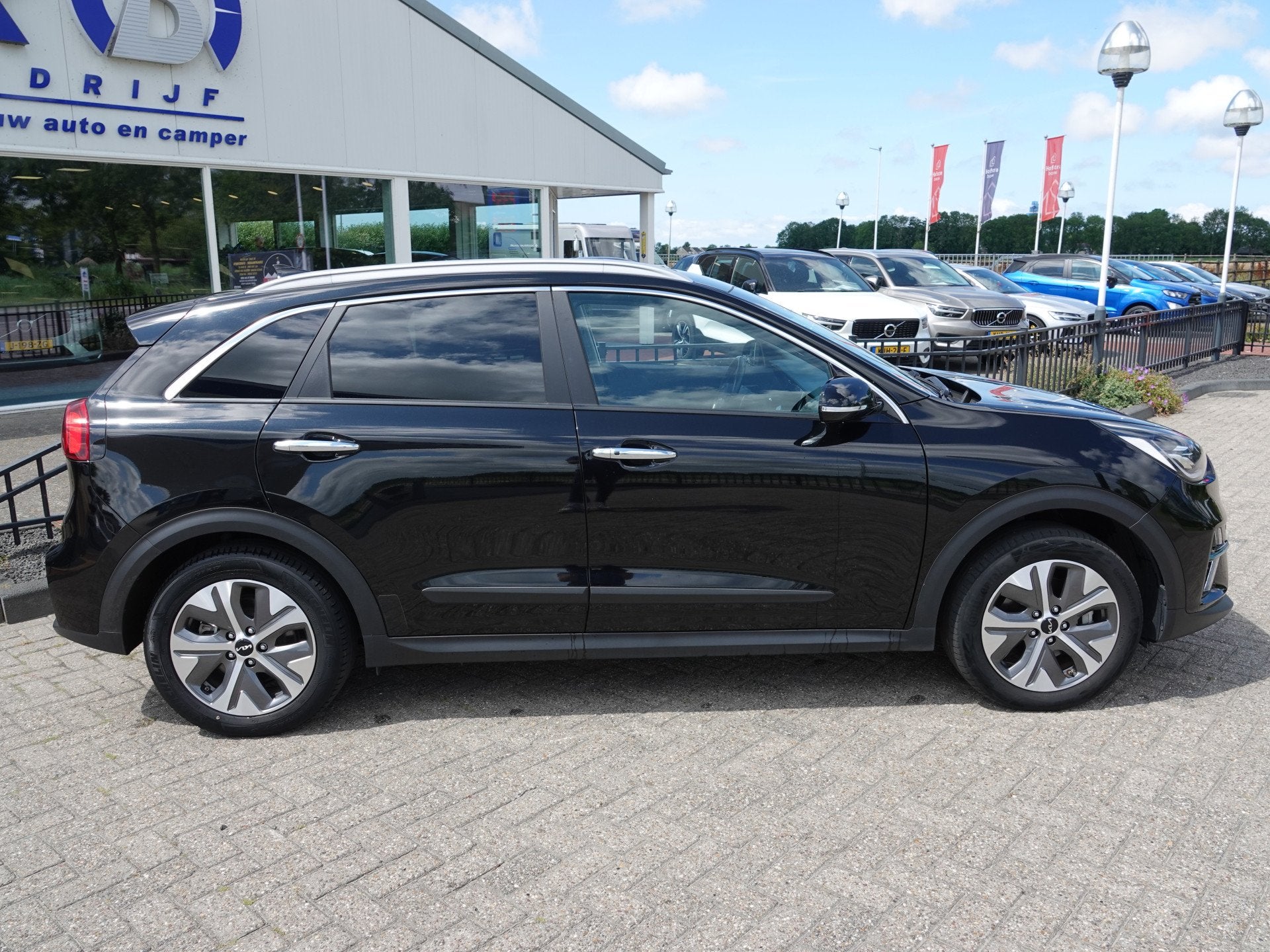Kia e-Niro DynamicPlusLine 64 kWh SOH 97,6% | SCHUIFDAK | H-, Gebruikt, 1712 kg, Leder en Stof, Zwart