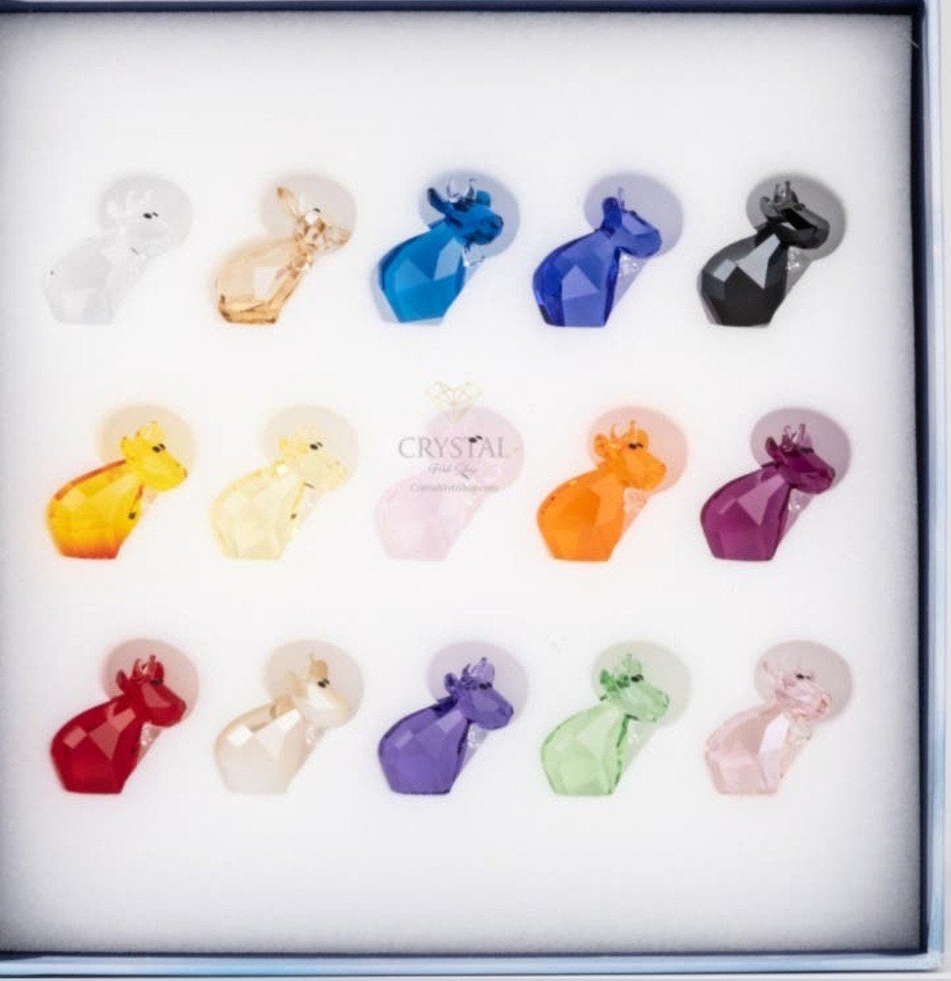 Swarovski Mini Mo set 12 delig nieuw, Ophalen of Verzenden, Nieuw, Figuurtje